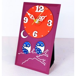 26. Reloj redondo con base rectangular de cristal 11x19cm. Búhos azules.
