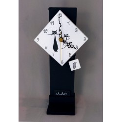 11. Reloj cristal péndulo con soporte o para pared 13x25cm. Flora