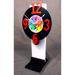 24. Rellotge vinil pèndul 12x26cm. Saxo
